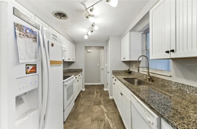 Experience Florida living at its finest in this beautifully on Jacaranda West Country Club in Florida - for sale on GolfHomes.com, golf home, golf lot
