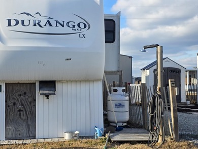 Welcome to coastal living at 120 Quarterdeck Street in North on North Shore Country Club in North Carolina - for sale on GolfHomes.com, golf home, golf lot
