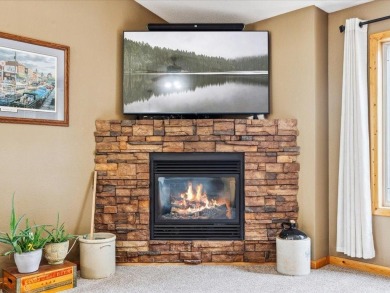 Nestled on a tranquil dead-end road, this stunning four-bedroom on Deacons Lodge Golf Course in Minnesota - for sale on GolfHomes.com, golf home, golf lot