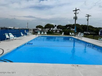 Welcome to coastal living at 120 Quarterdeck Street in North on North Shore Country Club in North Carolina - for sale on GolfHomes.com, golf home, golf lot