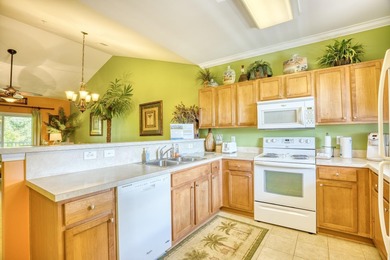 This two-bedroom, two-bath condo is located in the admired on Barefoot Resort and Golf Club  in South Carolina - for sale on GolfHomes.com, golf home, golf lot