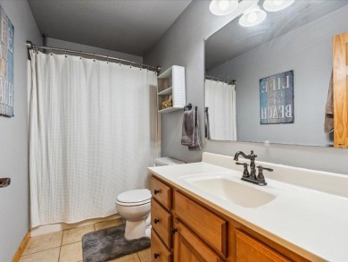 Nestled on a tranquil dead-end road, this stunning four-bedroom on Deacons Lodge Golf Course in Minnesota - for sale on GolfHomes.com, golf home, golf lot