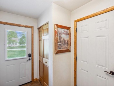 Nestled on a tranquil dead-end road, this stunning four-bedroom on Deacons Lodge Golf Course in Minnesota - for sale on GolfHomes.com, golf home, golf lot
