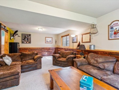 Nestled on a tranquil dead-end road, this stunning four-bedroom on Deacons Lodge Golf Course in Minnesota - for sale on GolfHomes.com, golf home, golf lot
