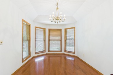Discover this all-brick gem in the Oaks subdivision, perfectly on Twin Lakes Golf Club in Arkansas - for sale on GolfHomes.com, golf home, golf lot