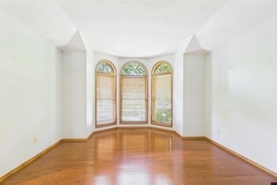 Discover this all-brick gem in the Oaks subdivision, perfectly on Twin Lakes Golf Club in Arkansas - for sale on GolfHomes.com, golf home, golf lot