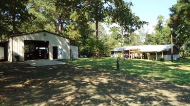 A beautiful water-view home on Toledo Bend Lake.  THIS ONE on Cypress Bend Golf Course in Texas - for sale on GolfHomes.com, golf home, golf lot