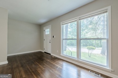 This home qualifies for up to $15,000 in grants-no income limits on Browns Mill Golf Course in Georgia - for sale on GolfHomes.com, golf home, golf lot