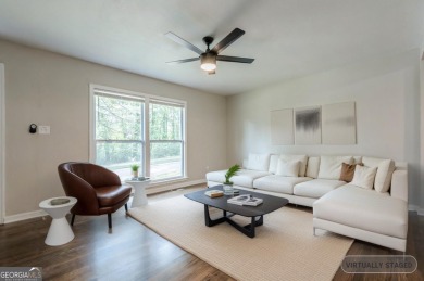 This home qualifies for up to $15,000 in grants-no income limits on Browns Mill Golf Course in Georgia - for sale on GolfHomes.com, golf home, golf lot