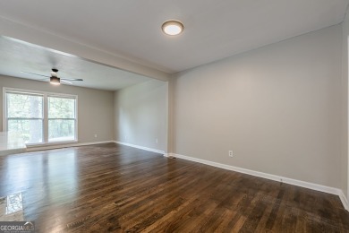 This home qualifies for up to $15,000 in grants-no income limits on Browns Mill Golf Course in Georgia - for sale on GolfHomes.com, golf home, golf lot