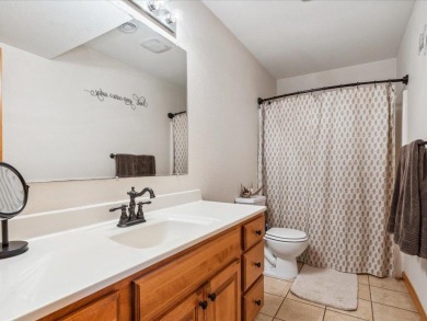 Nestled on a tranquil dead-end road, this stunning four-bedroom on Deacons Lodge Golf Course in Minnesota - for sale on GolfHomes.com, golf home, golf lot