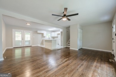 This home qualifies for up to $15,000 in grants-no income limits on Browns Mill Golf Course in Georgia - for sale on GolfHomes.com, golf home, golf lot