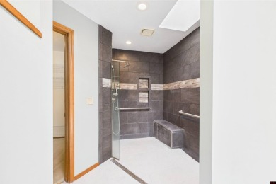 Discover this all-brick gem in the Oaks subdivision, perfectly on Twin Lakes Golf Club in Arkansas - for sale on GolfHomes.com, golf home, golf lot