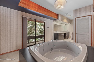 Opportunity to own a designer home situated on the 14th fairway on Twin Lakes Village Golf Course in Idaho - for sale on GolfHomes.com, golf home, golf lot