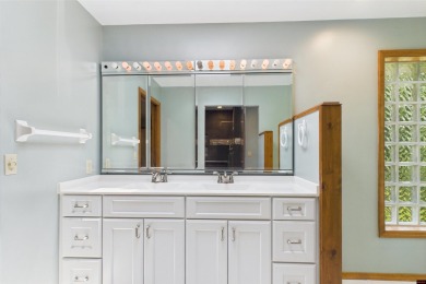 Discover this all-brick gem in the Oaks subdivision, perfectly on Twin Lakes Golf Club in Arkansas - for sale on GolfHomes.com, golf home, golf lot