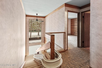 Opportunity to own a designer home situated on the 14th fairway on Twin Lakes Village Golf Course in Idaho - for sale on GolfHomes.com, golf home, golf lot