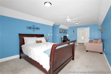 Welcome to this beautifully maintained gem in the highly sought on Gates Four Golf and Country Club in North Carolina - for sale on GolfHomes.com, golf home, golf lot