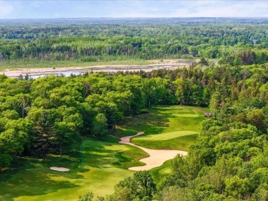 Nestled on a tranquil dead-end road, this stunning four-bedroom on Deacons Lodge Golf Course in Minnesota - for sale on GolfHomes.com, golf home, golf lot