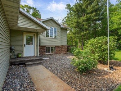 Nestled on a tranquil dead-end road, this stunning four-bedroom on Deacons Lodge Golf Course in Minnesota - for sale on GolfHomes.com, golf home, golf lot