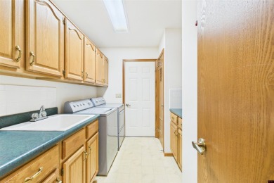 Discover this all-brick gem in the Oaks subdivision, perfectly on Twin Lakes Golf Club in Arkansas - for sale on GolfHomes.com, golf home, golf lot