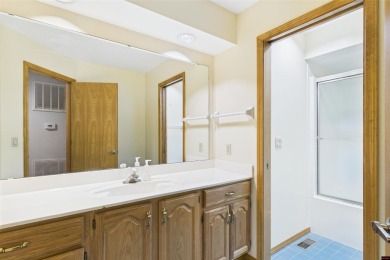 Discover this all-brick gem in the Oaks subdivision, perfectly on Twin Lakes Golf Club in Arkansas - for sale on GolfHomes.com, golf home, golf lot