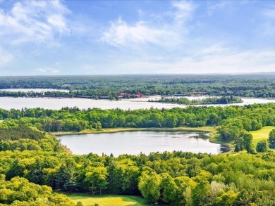 Nestled on a tranquil dead-end road, this stunning four-bedroom on Deacons Lodge Golf Course in Minnesota - for sale on GolfHomes.com, golf home, golf lot