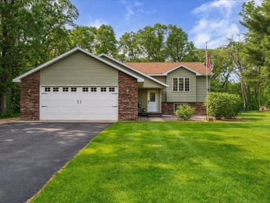 Nestled on a tranquil dead-end road, this stunning four-bedroom on Deacons Lodge Golf Course in Minnesota - for sale on GolfHomes.com, golf home, golf lot
