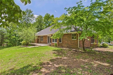 Discover this all-brick gem in the Oaks subdivision, perfectly on Twin Lakes Golf Club in Arkansas - for sale on GolfHomes.com, golf home, golf lot