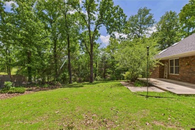 Discover this all-brick gem in the Oaks subdivision, perfectly on Twin Lakes Golf Club in Arkansas - for sale on GolfHomes.com, golf home, golf lot