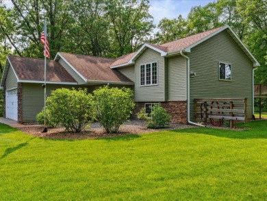 Nestled on a tranquil dead-end road, this stunning four-bedroom on Deacons Lodge Golf Course in Minnesota - for sale on GolfHomes.com, golf home, golf lot