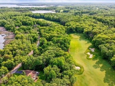 Nestled on a tranquil dead-end road, this stunning four-bedroom on Deacons Lodge Golf Course in Minnesota - for sale on GolfHomes.com, golf home, golf lot