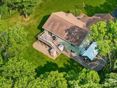 Nestled on a tranquil dead-end road, this stunning four-bedroom on Deacons Lodge Golf Course in Minnesota - for sale on GolfHomes.com, golf home, golf lot