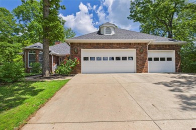 Discover this all-brick gem in the Oaks subdivision, perfectly on Twin Lakes Golf Club in Arkansas - for sale on GolfHomes.com, golf home, golf lot