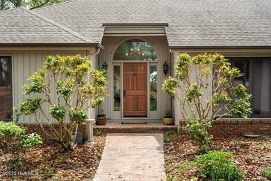 Welcome to this beautifully updated single-level home, perfectly on Pinewild Country Club of Pinehurst in North Carolina - for sale on GolfHomes.com, golf home, golf lot