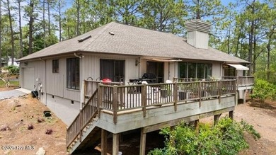Welcome to this beautifully updated single-level home, perfectly on Pinewild Country Club of Pinehurst in North Carolina - for sale on GolfHomes.com, golf home, golf lot