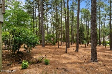 Welcome to this beautifully updated single-level home, perfectly on Pinewild Country Club of Pinehurst in North Carolina - for sale on GolfHomes.com, golf home, golf lot