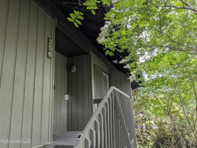 Rare find! This charming 3 bedroom 2 bath condo in Lanai Village on Diamondhead Country Club in Mississippi - for sale on GolfHomes.com, golf home, golf lot