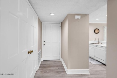 Rare find! This charming 3 bedroom 2 bath condo in Lanai Village on Diamondhead Country Club in Mississippi - for sale on GolfHomes.com, golf home, golf lot