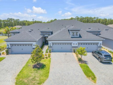 Step into refined elegance with this meticulously maintained on Plantation Bay Golf and Country Club in Florida - for sale on GolfHomes.com, golf home, golf lot