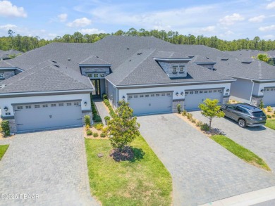 Step into refined elegance with this meticulously maintained on Plantation Bay Golf and Country Club in Florida - for sale on GolfHomes.com, golf home, golf lot