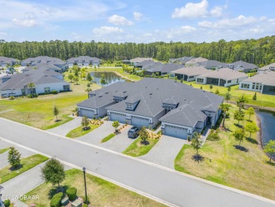 Step into refined elegance with this meticulously maintained on Plantation Bay Golf and Country Club in Florida - for sale on GolfHomes.com, golf home, golf lot