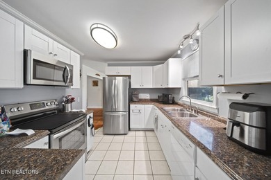 Situated on a beautifully wooded lot in the heart of Baneberry on Baneberry Golf and Resort Club in Tennessee - for sale on GolfHomes.com, golf home, golf lot