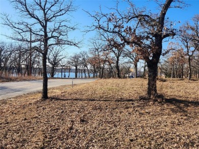 Beautiful undeveloped build site with breathtaking views of Lake on Nocona Hills Golf Course in Texas - for sale on GolfHomes.com, golf home, golf lot