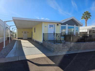 This home has undergone a stunning remodel, both inside and out! on Viewpoint Golf Resort in Arizona - for sale on GolfHomes.com, golf home, golf lot