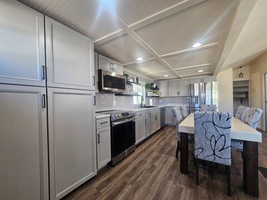 This home has undergone a stunning remodel, both inside and out! on Viewpoint Golf Resort in Arizona - for sale on GolfHomes.com, golf home, golf lot