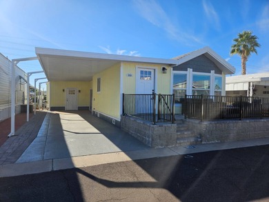 This home has undergone a stunning remodel, both inside and out! on Viewpoint Golf Resort in Arizona - for sale on GolfHomes.com, golf home, golf lot