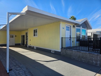 This home has undergone a stunning remodel, both inside and out! on Viewpoint Golf Resort in Arizona - for sale on GolfHomes.com, golf home, golf lot