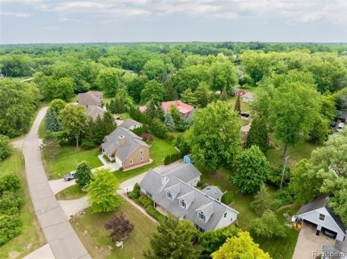 Expansive 2,184 sq. ft. home with a 1,456 sq. ft. basement and on West Shore Golf and Country Club in Michigan - for sale on GolfHomes.com, golf home, golf lot