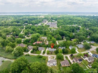 Expansive 2,184 sq. ft. home with a 1,456 sq. ft. basement and on West Shore Golf and Country Club in Michigan - for sale on GolfHomes.com, golf home, golf lot