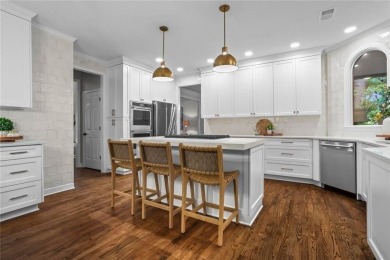Nestled in the heart of Alpharetta this renovated home in on The Golf Club of Georgia in Georgia - for sale on GolfHomes.com, golf home, golf lot